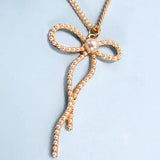 Pearl Embellished Bow Pendant Necklace